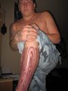 college humer tattoo on leg